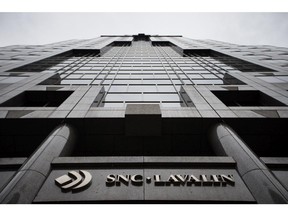 The building with the sign and logo for the Montreal based engineering and construction firm SNC-Lavalin in Montreal on Wednesday, October 16, 2013.