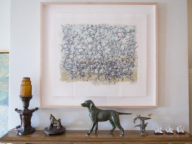 An original Riopelle hangs above the fireplace.