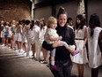 Mélissa Nepton, holding daughter Olivia, at the finale of her spring summer presentation at the Darling Foundry last Wednesday.