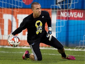 Impact goalkeeper Evan Bush wears a special cancer awareness shirt during warmup before an MLS game against the Los Angeles Galaxy on Sept. 10, 2014 at Saputo Stadium.