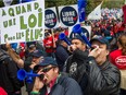 Protesters gather near Lafontaine Park during a demonstration against pension reform.