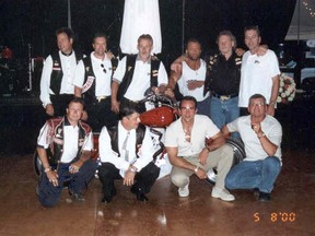 The Hells Angels Nomads chapter during better times. A group photo taken while they celebrated the August 5, 2000 wedding of a fellow Hells Angel.  From left to right top: Michel Rose (sentenced to 22 years), Donald (Pup) Stockford (sentenced to 20 years), Gilles (Trooper) Mathieu (sentenced to 20 years), Richard (Dick) Mayrand (sentenced to 22 years), Denis Houle (sentenced to 20 years), David (Wolf) Carroll (yet to be arrested in Operation Springtime 2001). From left to right bottom: Walter (Nurget) Stadnick (sentenced to 20 years), René Charlebois (sentenced to 20 years), Normand Robitaille (sentenced to 21 years), Maurice (Mom) Boucher (sentenced to life in prison for ordering the deaths of two prison guards).