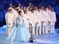 Russian soprano Anna Netrebko sings the Olympic Anthem during the Opening Ceremony of the Sochi Winter Olympics at the Fisht Olympic Stadium on February 7, 2014 in Sochi.