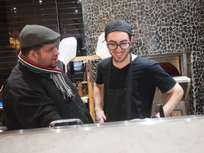 Chef Angelo Mercuri (left) instructs Bàcaro second pizza chef Anthony Mastracchio (right).
