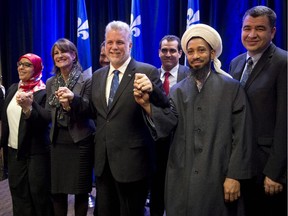 Quebec Premier Philippe Couillard met with members of Quebec's Muslim community in Montreal on Monday.