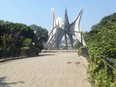 The curved, tree-lined Promenade des Îles on Île-Ste-Hélène goes through the legs of Alexander Calder's sculpture Man, and then to a lookout facing the downtown skyline.