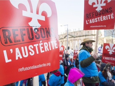 Protesters participate in an anti-austerity demonstration in Montreal Saturday, November 29, 2014.
