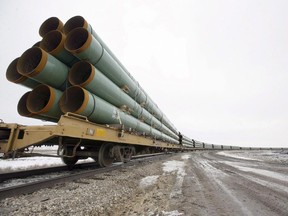 Pipeline equipment is being transported on a trailer.