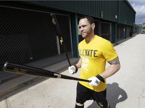 Russell Martin makes his way to the batting cage during spring training with the Pittsburgh Pirates on Feb. 11, 2013, in Bradenton, Fla.