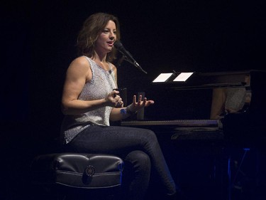 Sarah McLachlan talks to fans as she performs in concert at the Théâtre  St-Denis in Montreal, Saturday, November 15, 2014.