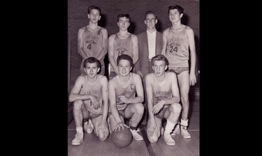 Basketball was one of the first sports in which Sun Youth youngsters took part. This picture shows Team Captain Earl De La Perralle (front row center) and Sid Stevens (back row, third from the left).