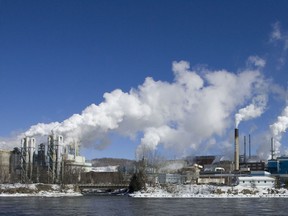 Steam and smoke rise from Tembec's pulp mill in Témiscaming, Qc.