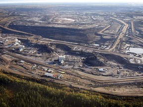 This Sept. 19, 2011 aerial photo shows a tar sands mine facility near Fort McMurray, Alta.
