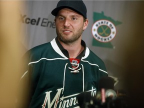 Thomas Vanek poses after he signed a three-year, $19.5-million free-agent deal to play with the Minnesota Wild on July 1, 2014 in St. Paul, Minn.