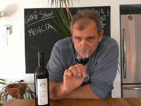 Gazette wine critic Bill Zacharkiw sipping a glass of Pittacum red wine from Bierzo, made with the mencia grape.