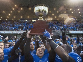 Montreal Carabins hoist the Uteck Bowl trophy after defeating the Manitoba Bisons on Nov. 22, 2014 to earn a trip to the Vanier Cup.