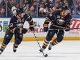 Former Canadiens captain Brian Gionta, now captain of the Sabres, skates beside Zemgus Girgensons during game against the Winnipeg Jets on Nov. 26 at Buffalo's First Niagara Center. Winnipeg won the game 2-1.