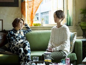 May (Xie Yi Lin), left, gives advice to Angie (Zhou Xun). (China Lion Film).