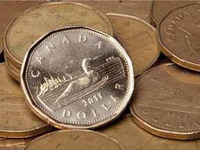 Canadian dollars are pictured in Vancouver, Sept. 22, 2011. THE CANADIAN PRESS/Jonathan Hayward