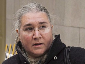 Pamela Porter leaves court on Dec. 19, 2013, in Montreal.