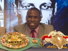 World light-heayweight champion Adonis Stevenson speaks to the media at a news conference on Nov. 5, 2014 in Montreal. Stevenson will defend his title against Dmitry Sukhotsky on Dec. 19, 2014 in Quebec City.