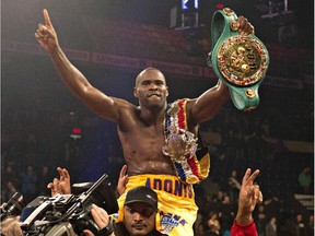 Adonis Stevenson celebrates his victory against Dmitri Sukhotskiy after a WBC light- heavyweight championship fight on Dec. 19, 2014 at the Pepsi Colisée in Quebec City.