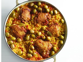 A Spanish style chicken and rice dinner dish is flavoured with olives, garlic and saffron.