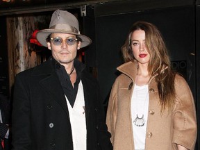 Johnny Depp and Amber Heard seen here arriving at the Broadway opening night of "Cabaret" at Studio 54 on April 24, 2014 in New York City.