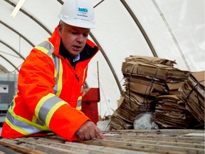 Matt Manson, President and CEO of Stornaway Diamond Corp, gets a closer look at rock cores taken on the site of the Renard diamond mine on Thursday October 03, 2013.