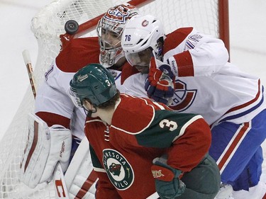 A shot by Minnesota Wild left wing Jason Zucker gets behind Montreal Canadiens goalie Carey Price, rear, as Wild centre Charlie Coyle (3) and Canadiens defenceman P.K. Subban, right, watch the goal during the first period of an NHL hockey game in St. Paul, Minn., Wednesday, Dec. 3, 2014.