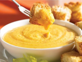 Cheese fondue is easy to make in a slow cooker.