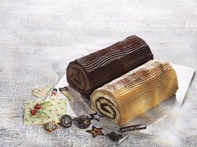 Yule log cakes you can decorate at home are offered, along with assorted trimmings, at Au Pain Doré stores.