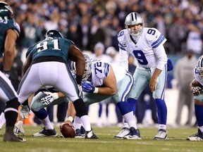 Dallas Cowboys QB Tony Romo stands at the line of scrimmage during game against the Eagles at Lincoln Financial Field on Dec. 14, 2014 in Philadelphia.