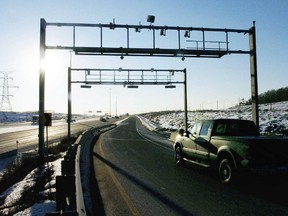 Vehicles on the 407 toll highway are seen through cameras on the on ramp in Toronto Tuesday February 01, 2005.