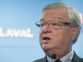 Former Laval Mayor Gilles Vaillancourt makes a statement to the media at City Hall in Laval, Que., on October 5, 2012.