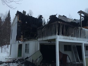 The remains of a fire in St. Donat where a drug lab was found Dec. 16, 2014.