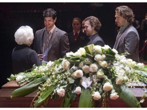 Montreal Canadiens players Max Pacioretty, left, David Desharnais, centre, and P.A. Parenteau, right offer their condolences to Elise Beliveau, widow of Montreal Canadiens legend Jean Beliveau during the visitation at the Bell Center Monday, December 8, 2014 in Montreal. The Montreal Canadiens hockey legend passed away Tuesday, Dec. 2, 2014 at the age of 83.THE CANADIAN PRESS/Ryan Remiorz