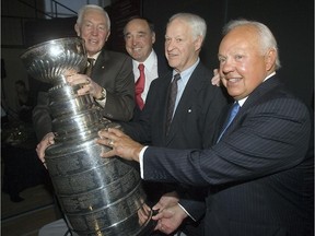 Jean Béliveau (left) poses with fellow Hall of Famers Frank Mahovlich, Gordie Howe and Yvan Cournoyer with the Stanley Cup when the Montreal Jewish Hall of Fame payed tribute to Béliveau on April 30, 2008.