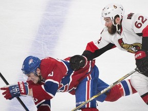 Montreal Canadiens' Jiri Sekac, left, collides with Ottawa Senators' Eric Gryba during second period NHL hockey action in Montreal, Saturday, December 20, 2014.