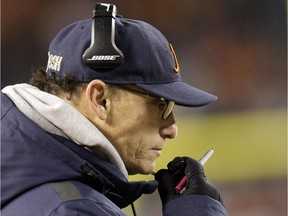 Bears head coach Marc Trestman talks on his headset during the second half of NFL game against the Dallas Cowboys on Dec. 4, 2014, in Chicago.