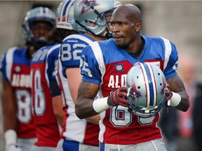 Alouettes receiver Chad Johnson puts his helmet on during warmup before game against the Ottawa Redblacks at Molson Stadium on Aug. 29, 2014.