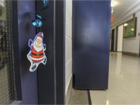 A Santa decoration hangs from a classroom door at the Batshaw Youth and Family Centre's Dorval Campus on Monday. Dec. 8, 2014.