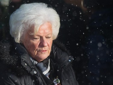 Élise Béliveau, widow of Montreal Canadiens great Jean Béliveau, leaves the funeral of her husband at the Mary Queen of the World Cathedral in Montreal on Wednesday, December 10, 2014.