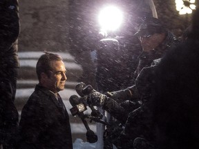 Canadiens owner, president and CEO Geoff Molson chats with reporters after the funeral for Hall of Famer Jean Béliveau at Mary, Queen of the World Cathedral in Montreal on Dec. 10, 2014.