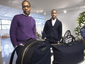 Brothers Dexter, left, and Byron Peart who built their brand of leather goods, Want Les Essentiels de la Vie, into an international success story, in their showroom in Montreal on Friday December 12, 2014. (Pierre Obendrauf / MONTREAL GAZETTE)