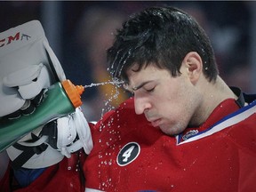 Canadiens goalie Carey Price sprays water in his face before game against the Los Angeles Kings at the Bell Centre on Dec. 12, 2014. Price made 44 saves as the Canadiens won 6-2.