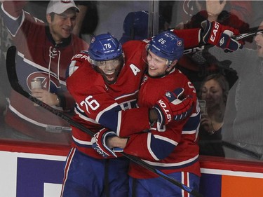 Montreal Canadiens Jiri Sekac, right, celebrates his third-period goal with teammate P.K. Subban against the Los Angeles Kings during National Hockey League game in Montreal Friday December 12, 2014.