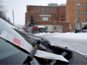 A car with a municipal parking ticket.