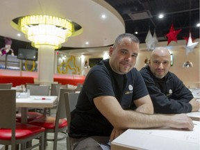 Greg Konstantakos, left and Tom Bountis partners and childhood friends who started the Allô! Mon Coco breakfast restaurant chain, at their first store in Ste-Dorothée, Laval, north of Montreal, Saturday December 13, 2014.  There are now 13 restaurants in the Montreal area and the have plans to expand into the US.