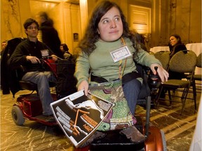 Laurence Parent, vice- president of RAPLIQ, goes into the Montreal council meeting to seek access for disabled people to the métro system on Wednesday, Dec. 15, 2010.